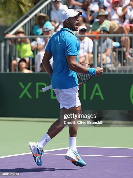 Jo-Wilfried Tsonga of France celebrates a point against Marcos Baghdatis of Cyprus during their third round match during day 7 at the Sony Open at...