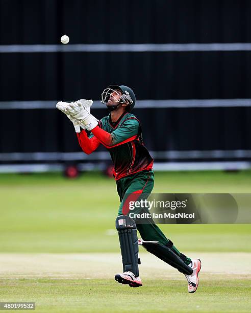 Rakep Patel of Kenya catches out Rizwan Cheema of Canada during the ICC World Twenty20 India Qualifier between Canada and Kenya at Myreside Cricket...