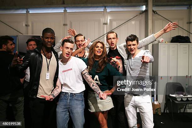 Models are seen backstage ahead of the Emre Erdemoglu show during the Mercedes-Benz Fashion Week Berlin Spring/Summer 2016 at Brandenburg Gate on...