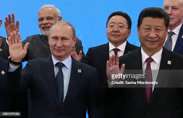 Indian Prime Minister Narendra Modi, Russian President Vladimir Putin, Mongol President Tsakhiajin Elbegdorj , Chinese President Xi Jinping pose for...