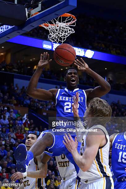 Alex Poythress of the Kentucky Wildcats dunks the ball against Wichita State Shockers during the third round of the 2014 NCAA Men's Basketball...