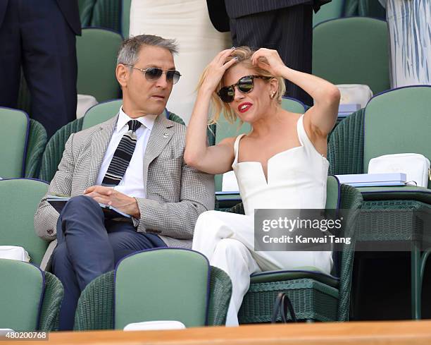 Ari Emanuel and Sienna Miller attend day eleven of the Wimbledon Tennis Championships at Wimbledon on July 10, 2015 in London, England.