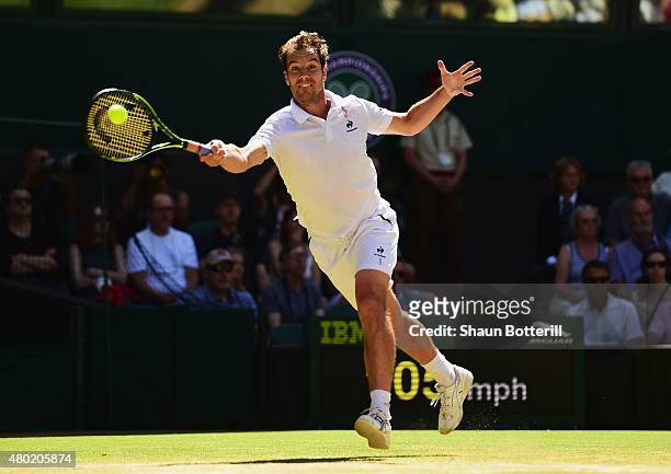 Richard Gasquet of France plays a forehand in the Gentlemens Singles Semi Final match against Novak Djokovic of Serbia during day eleven of the...