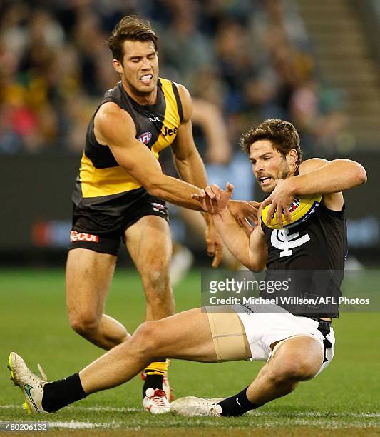 Levi Casboult of the Blues and Alex Rance of the Tigers in action during the 2015 AFL round 15 match between the Richmond Tigers and the Carlton...