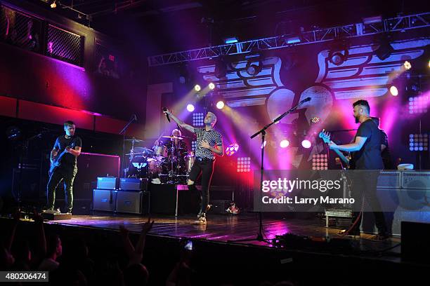 Chris Allen, Elaine Bradley, Tyler Glenn and Branden Campbell of Neon Trees perform at Revolution on July 9, 2015 in Fort Lauderdale, Florida.