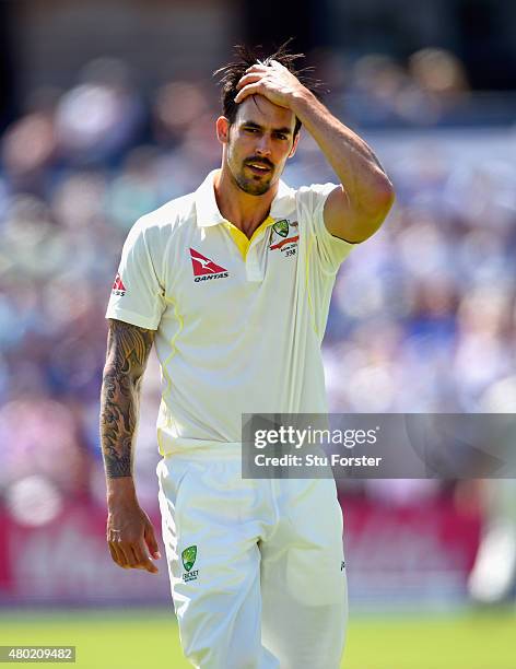 Australia bowler Mitchell Johnson reacts during day three of the 1st Investec Ashes Test match between England and Australia at SWALEC Stadium on...