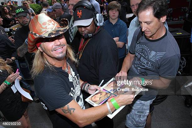 Bret Michaels signs autographs backstage at "FOX & Friends" All American Concert Series outside of FOX Studios on July 10, 2015 in New York City.