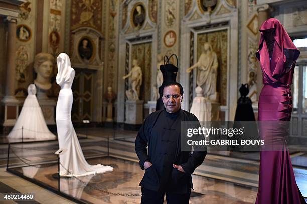 Tunisian-born, Paris-based couturier Azzedine Alaia poses during the press preview of the exhibition " Azzedine Alaia's soft sculpture" at the...