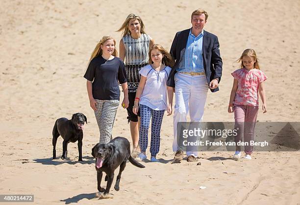 Princess Amalia, Queen Maxima, Princess Alexia, King Willem-Alexander and Princess Ariane of The Netherlands and their dogs Skipper and Nala pose for...