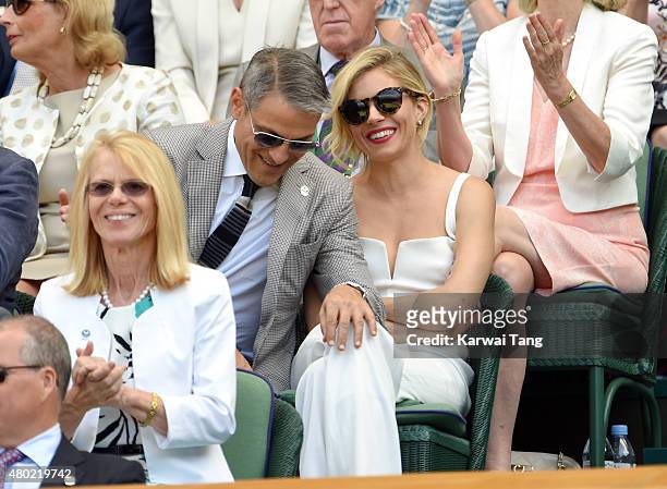 Ari Emanuel and Sienna Miller attend day eleven of the Wimbledon Tennis Championships at Wimbledon on July 10, 2015 in London, England.