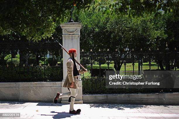 Greek Presidental Evzoni guard patrols the presidents residence on July 10, 2015 in Athens, Greece. Greek prime minister Alexis Tsipras is presenting...