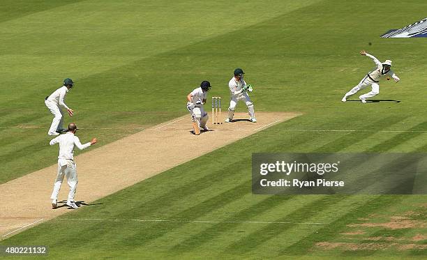 Michael Clarke of Australia takes a catch to dismiss Adam Lyth of England during day three of the 1st Investec Ashes Test match between England and...