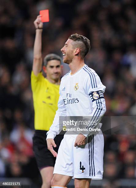 Sergio Ramos of Real Madrid is shown the red card by referee Alberto Undiano Mallenco during the La Liga match between Real Madrid CF and FC...