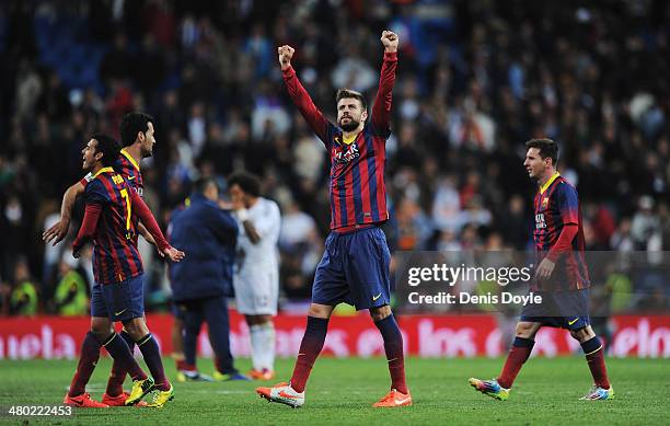 Gerard Pique of Barcelona celebrates victory after the La Liga match between Real Madrid CF and FC Barcelona at the Bernabeu on March 23, 2014 in...