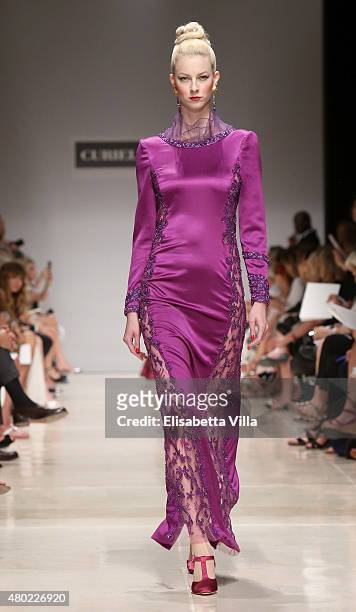 Model walks the runway at Curiel Couture fashion show as part of AltaRoma AltaModa Fashion Week Fall/Winter 2015/16 at Palazzo Delle Esposizioni on...