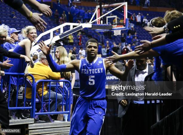 Kentucky Wildcats guard Andrew Harrison leaves the floor at the end of the game against the Wichita State Shockers during the third round of the NCAA...