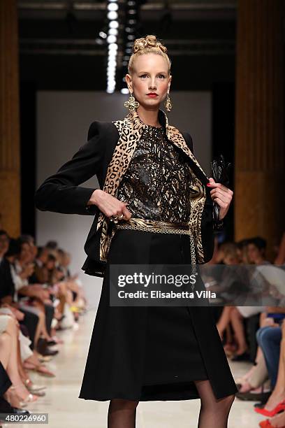 Model walks the runway at Curiel Couture fashion show as part of AltaRoma AltaModa Fashion Week Fall/Winter 2015/16 at Palazzo Delle Esposizioni on...