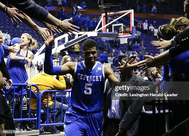 Kentucky Wildcats guard Andrew Harrison leaves the floor at the end of the game against the Wichita State Shockers during the third round of the NCAA...