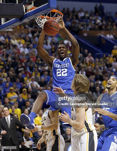 Kentucky Wildcats forward Alex Poythress dunks during the third round of the NCAA Tournament in St. Louis on Sunday, March 23, 2014. The Kentucky...