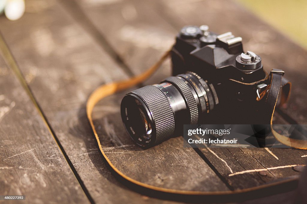 Analog film camera on the table