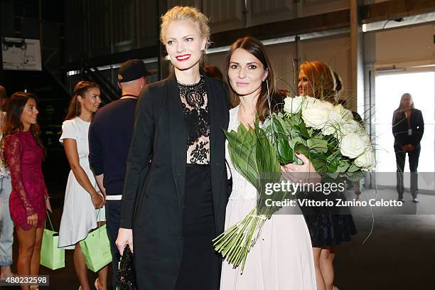 Franziska Knuppe and Ewa Herzog are seen backstage ahead of the Ewa Herzog show during the Mercedes-Benz Fashion Week Berlin Spring/Summer 2016 at...