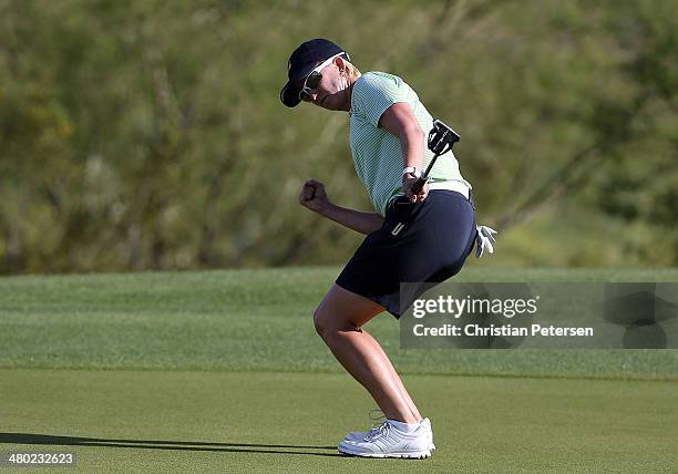 Karrie Webb of Australia celebrates a birdie putt on the 18th green to complete the final round of the JTBC LPGA Founders Cup at Wildfire Golf Club...