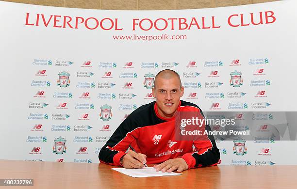 Martin Skrtel signs an extension contract for Liverpool at Melwood Training Ground on July 10, 2015 in Liverpool, England.