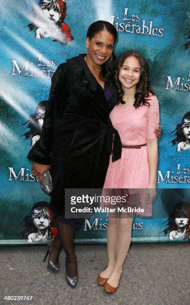 Audra McDonald and daughter Zoe Madeline Donovan attend the "Les Miserables" On Broadway Opening Night at Imperial Theatre on March 23, 2014 in New...