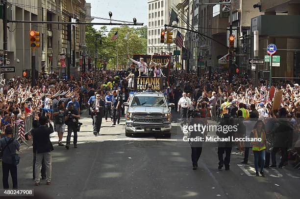 Soccer players Carli Lloyd, Mayor Bill de Blasio, soccer player Megan Rapinoe, Chirlane McCray and U.S. Coach Jill Ellis aboard a float in the New...