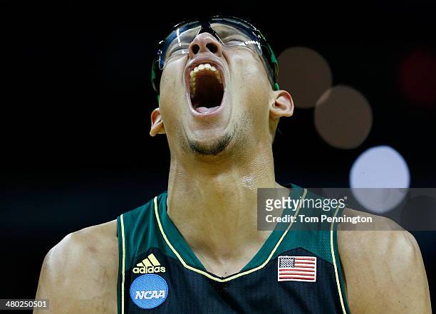 Isaiah Austin of the Baylor Bears reacts against the Creighton Bluejays during the third round of the 2014 NCAA Men's Basketball Tournament at the...
