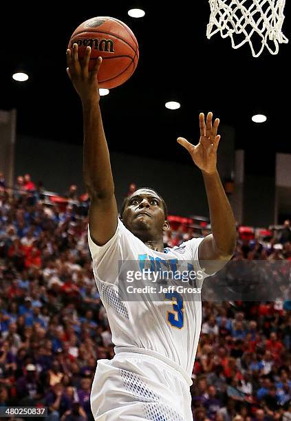Jordan Adams of the UCLA Bruins shoots against the Stephen F. Austin Lumberjacks in the second half during the third round of the 2014 NCAA Men's...