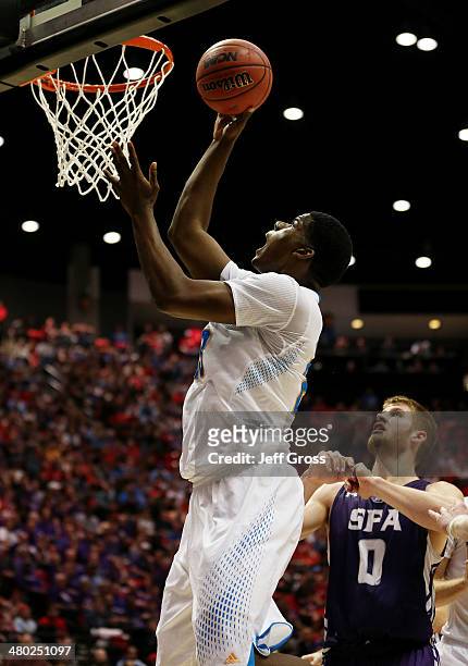 Tony Parker of the UCLA Bruins shoots over Thomas Walkup of the Stephen F. Austin Lumberjacks during the third round of the 2014 NCAA Men's...