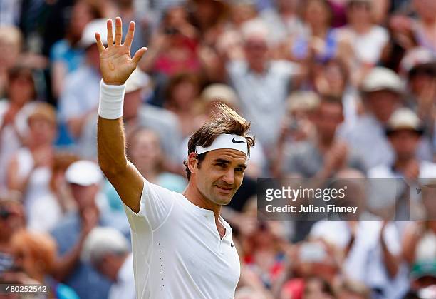 Roger Federer of Switzerland celebrates after winning the Gentlemens Singles Semi Final match against Andy Murray of Great Britain during day eleven...