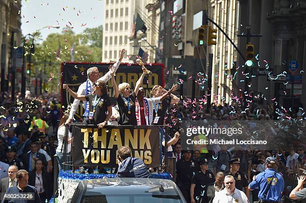 Mayor Bill de Blasio, Soccer players Carli Lloyd and Megan Rapinoe, Chirlane McCray and U.S. Coach Jill Ellis aboard a float in the New York City...