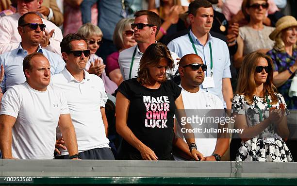 Coach Amelie Mauresmo and Jonas Bjorkman , fitness coach Matt Little , physio Shane Annun and Kim Murray react during Andy Murray of Great Britain...