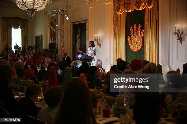 First lady Michelle Obama speaks during the annual ''Kids' State Dinner'' in the East Room at the White House July 10, 2015 in the East Room at the...