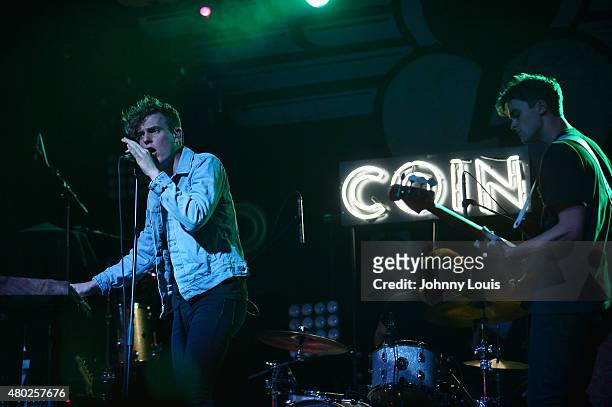 Chase Lawrence, Ryan Winnen and Zach Dyke of COIN performs during An Intimate Night Out at Revolution Live on July 9, 2015 in Fort Lauderdale,...