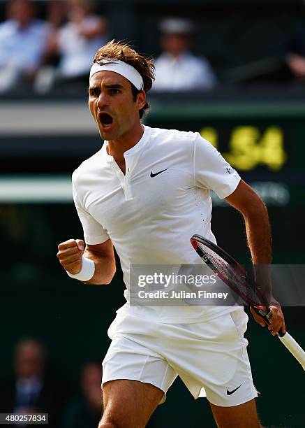 Roger Federer of Switzerland celebrates in the Gentlemens Singles Semi Final match against Andy Murray of Great Britain during day eleven of the...