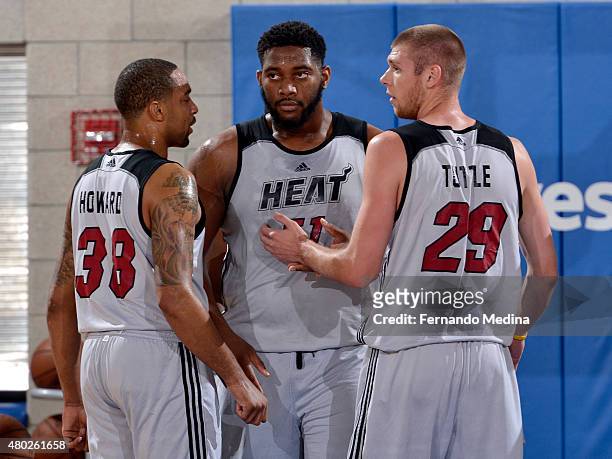 Juwan Howard Jr. #38, Joshua Smith, and Seth Tuttle of the Miami Heat chat during a game against the Detroit Pistons on July 10, 2015 at Amway Center...