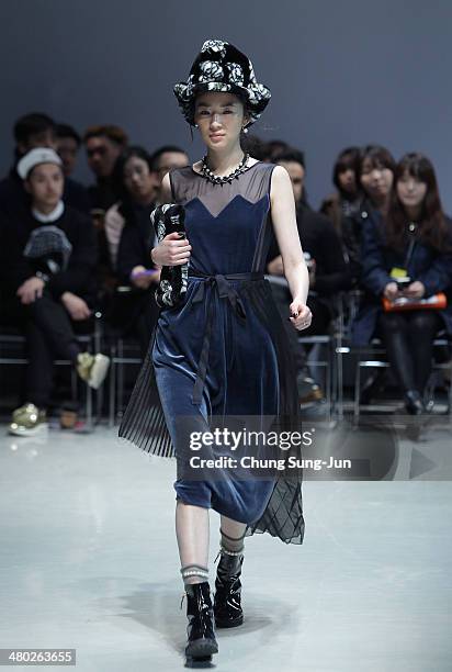 Model showcases designs on the runway during the Steve J and Yoni P show as part of Seoul Fashion Week F/W 2014 on March 24 in Seoul, South Korea.