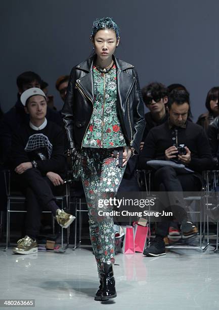 Model showcases designs on the runway during the Steve J and Yoni P show as part of Seoul Fashion Week F/W 2014 on March 24 in Seoul, South Korea.