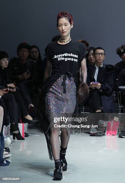 Model showcases designs on the runway during the Steve J and Yoni P show as part of Seoul Fashion Week F/W 2014 on March 24 in Seoul, South Korea.