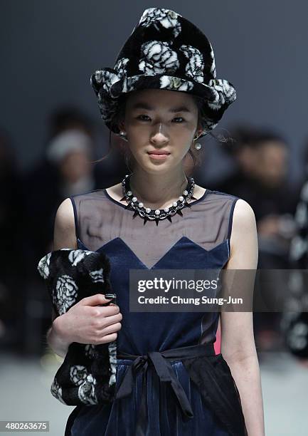 Model showcases designs on the runway during the Steve J and Yoni P show as part of Seoul Fashion Week F/W 2014 on March 24 in Seoul, South Korea.