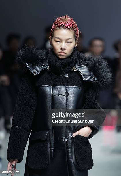 Model showcases designs on the runway during the Steve J and Yoni P show as part of Seoul Fashion Week F/W 2014 on March 24 in Seoul, South Korea.