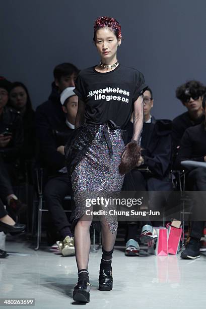 Model showcases designs on the runway during the Steve J and Yoni P show as part of Seoul Fashion Week F/W 2014 on March 24 in Seoul, South Korea.