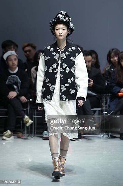 Model showcases designs on the runway during the Steve J and Yoni P show as part of Seoul Fashion Week F/W 2014 on March 24 in Seoul, South Korea.