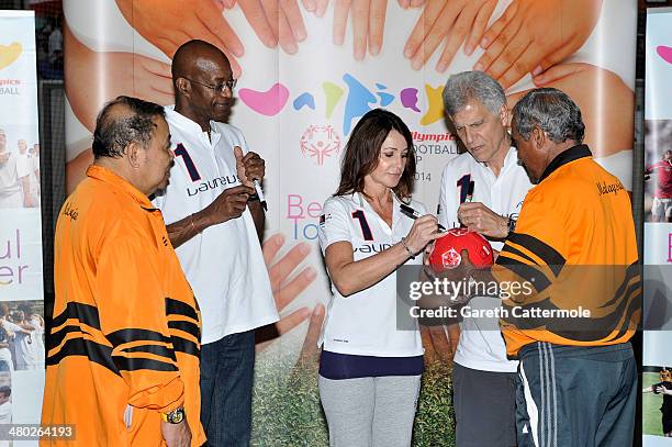 Datuk Muhammad Feisol Hassan President of the Special Olympics Malaysia with Laureus Academy Member Nadia Comaneci, Laureus Academy Chairman Edwin...