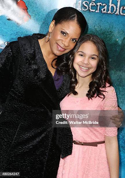 Audra McDonald and daughter Zoe Donovan attend the "Les Miserables" On Broadway Opening Night at Imperial Theatre on March 23, 2014 in New York City.
