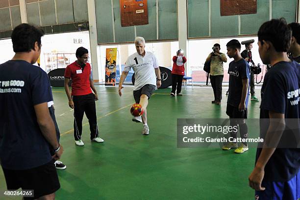 Laureus Academy Member Mark Spitz in action during the LWSA Special Olympics Project Visit part of the 2014 Laureus World Sports Awards on March 24,...