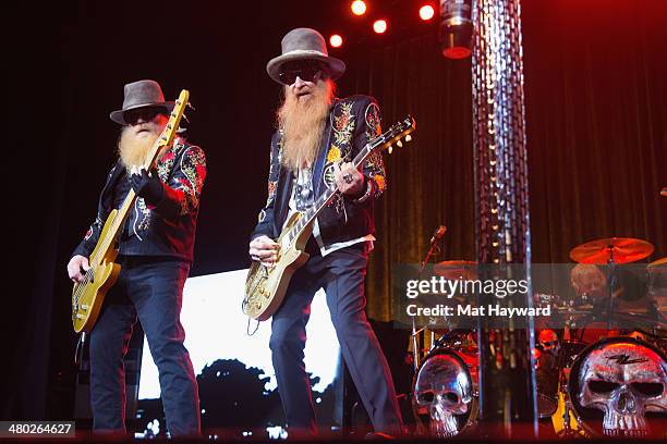 Dusty Hill and Billy Gibbons of ZZ Top perform on stage at The Moore Theater on March 23, 2014 in Seattle, Washington.